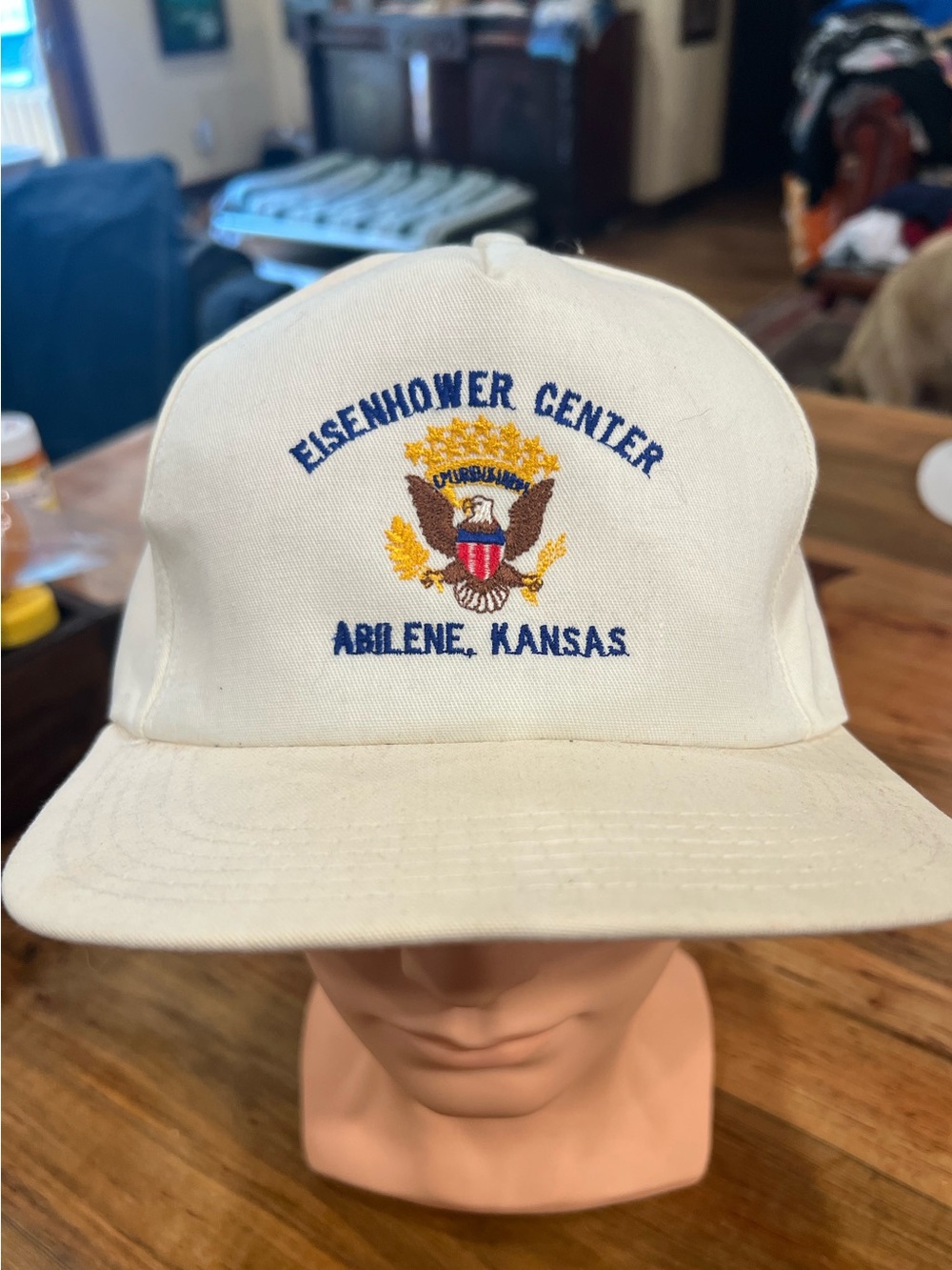 Eisenhower Center Abilene Kansas White Cap with Blue and Gold Embroidered Crest
